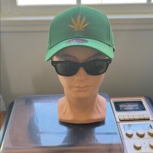 Green Cap with Leaf Design